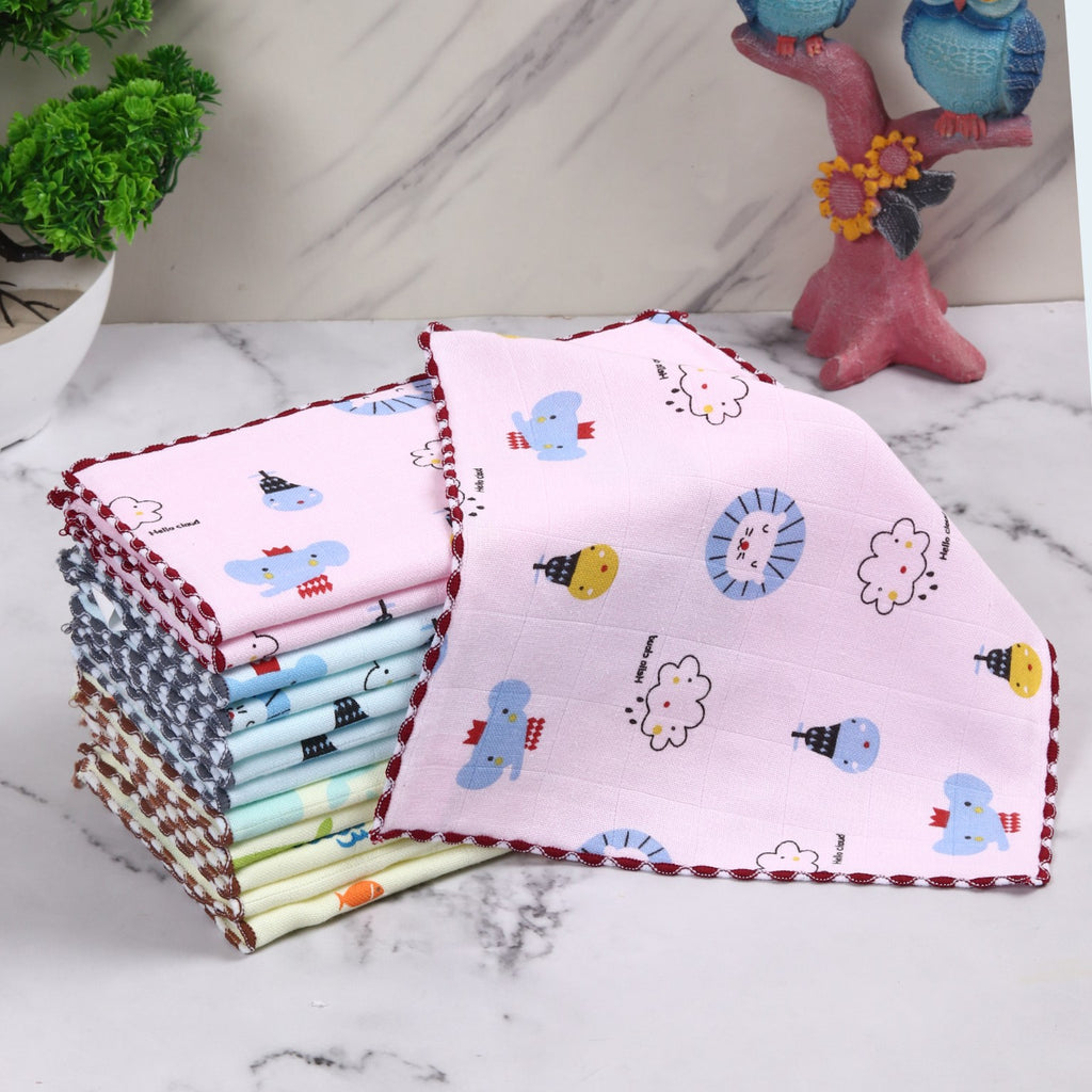 Printed cotton baby face towels stacked with a pink towel displayed