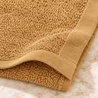 Jenny Denial Beige cotton terry face towel — terry fabric and hem detail, 400 GSM