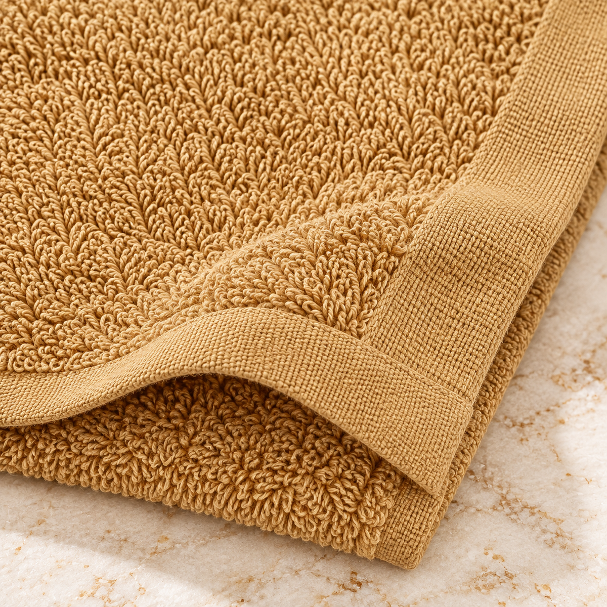 Jenny Denial Beige cotton terry face towel — terry fabric and hem detail, 400 GSM