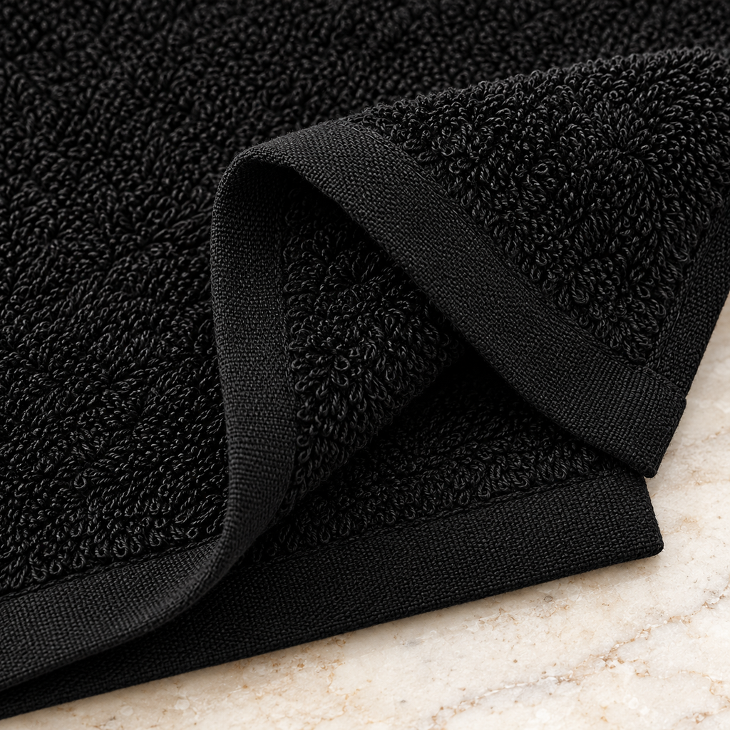 Jenny Denial Black cotton terry face towel, 12 × 12 inches, 400 GSM — fabric detail