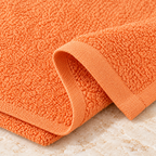 Jenny Denial Peach cotton terry face towel — terry fabric and hem detail, 400 GSM
