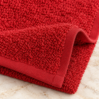 Jenny Denial Red cotton terry face towel — terry fabric and hem detail, 400 GSM