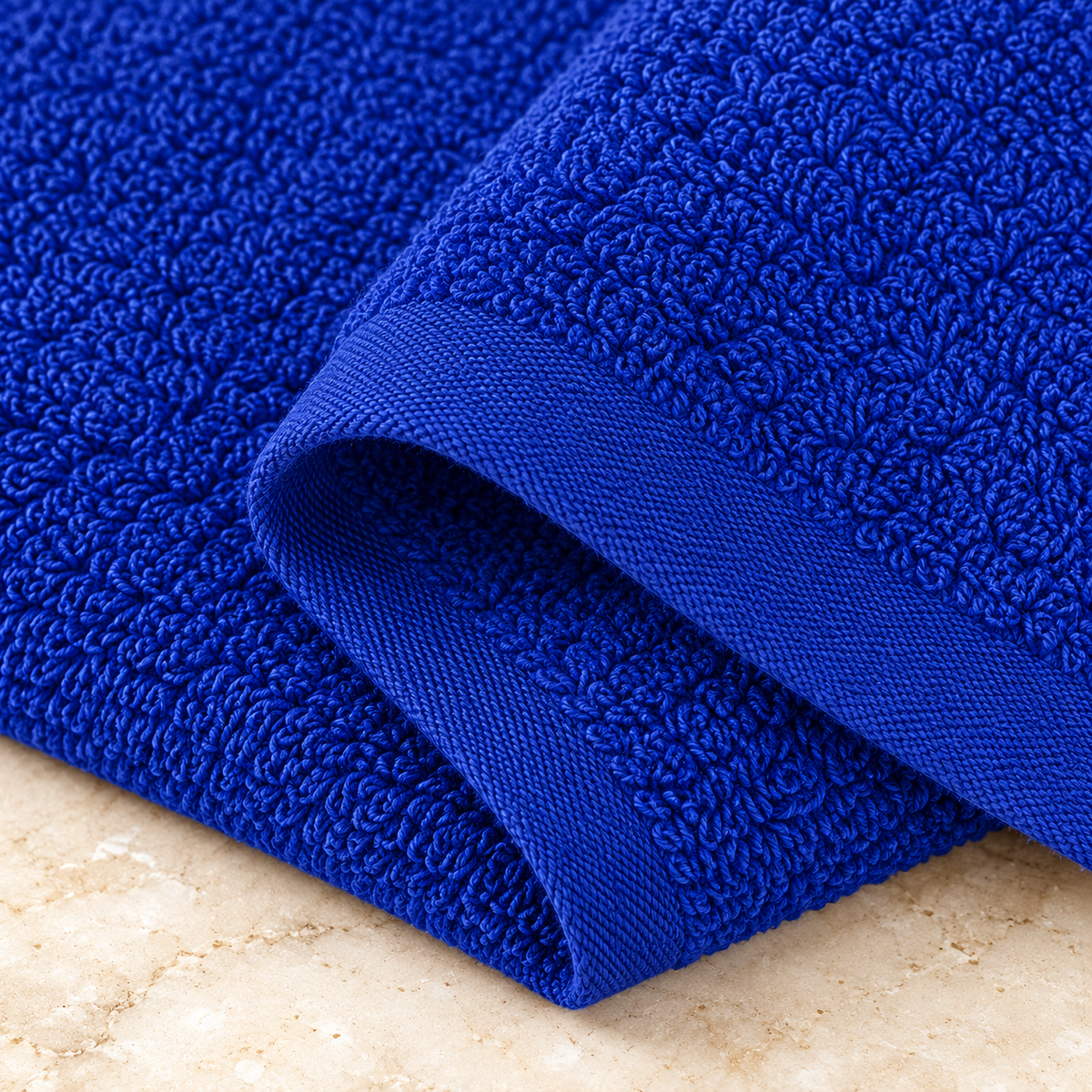 Jenny Denial Royal Blue cotton terry face towel — terry fabric and hem detail, 400 GSM